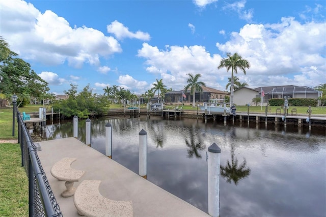 view of dock with a water view and glass enclosure