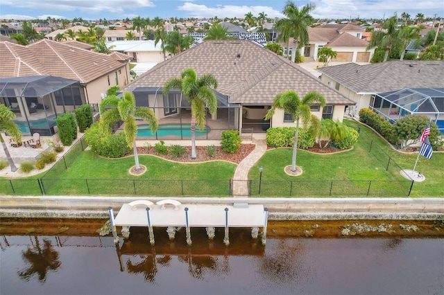 drone / aerial view featuring a water view