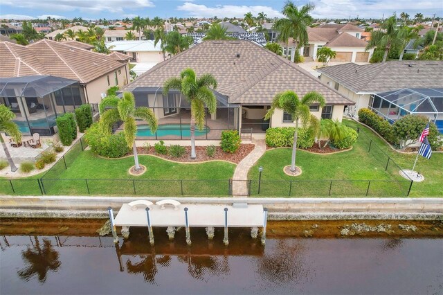 2517 Rio Grande Dr, Punta Gorda, FL 33950 - back of house featuring a residential view, a water view, stucco siding, and glass enclosure