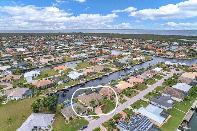 2517 Rio Grande Dr, Punta Gorda, FL 33950 - aerial view of property's location with nearby suburban area and a large body of water