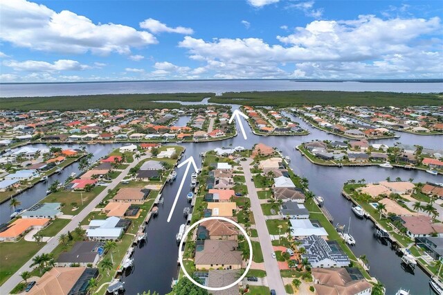 2517 Rio Grande Dr, Punta Gorda, FL 33950 - aerial perspective of suburban area with a nearby body of water
