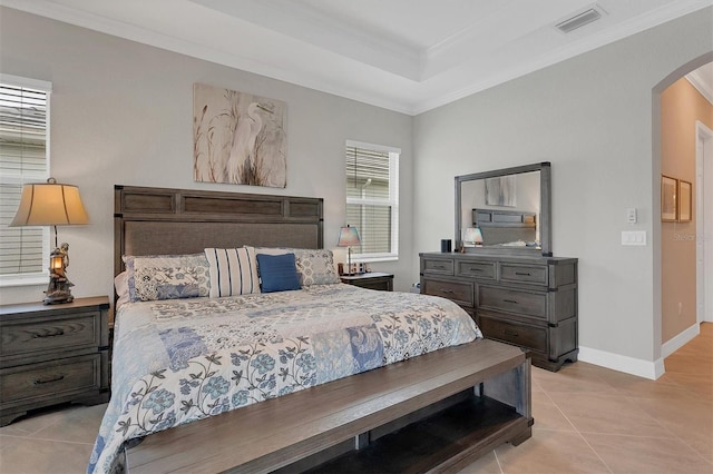 tiled bedroom featuring crown molding