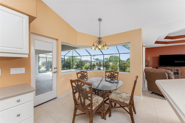 tiled dining room with lofted ceiling