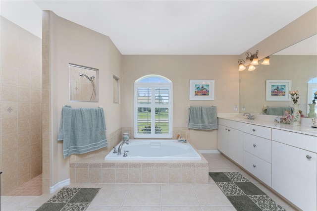 bathroom with vanity, plus walk in shower, and tile patterned floors