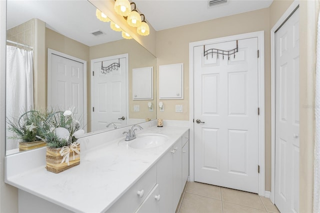 bathroom featuring vanity and tile patterned floors