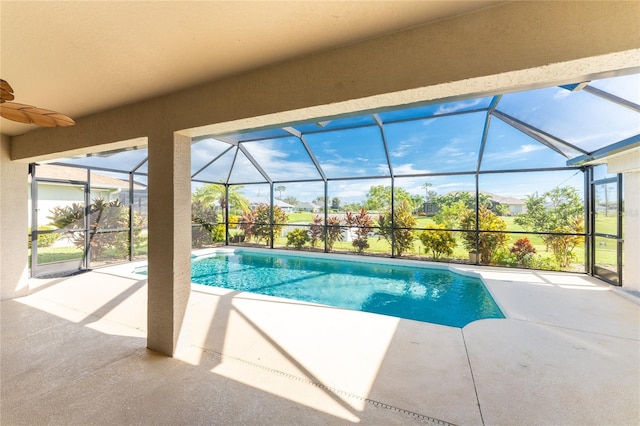 240 White Marsh Ln, Rotonda West, FL 33947 - pool featuring a patio, a ceiling fan, and glass enclosure