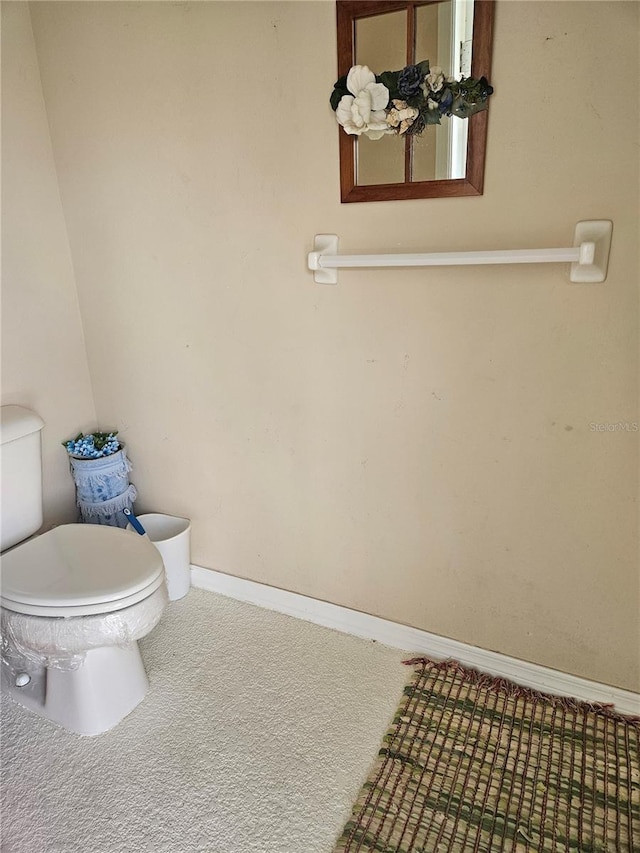 240 White Marsh Ln, Rotonda West, FL 33947 - bathroom featuring toilet and baseboards