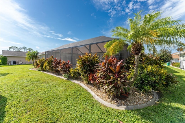 240 White Marsh Ln, Rotonda West, FL 33947 - view of yard featuring glass enclosure
