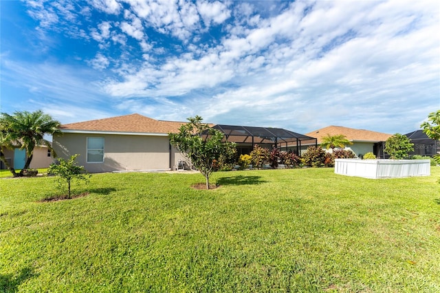 view of yard featuring a lanai