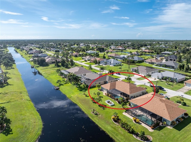 240 White Marsh Ln, Rotonda West, FL 33947 - birds eye view of property featuring a water view and a residential view