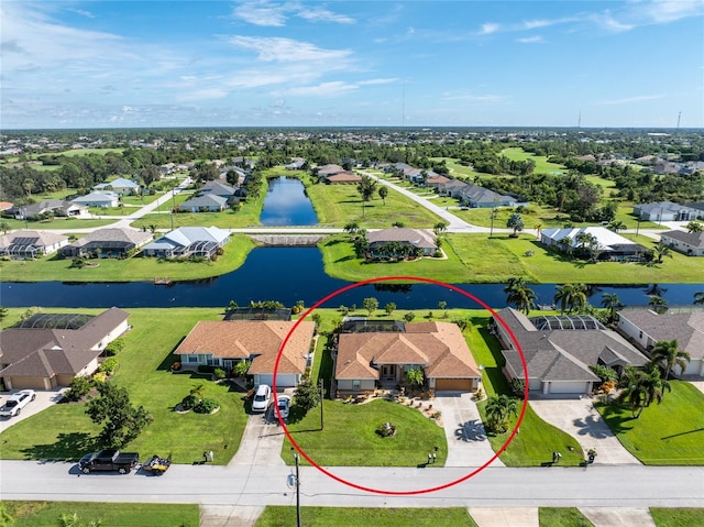240 White Marsh Ln, Rotonda West, FL 33947 - birds eye view of property with a water view and a residential view