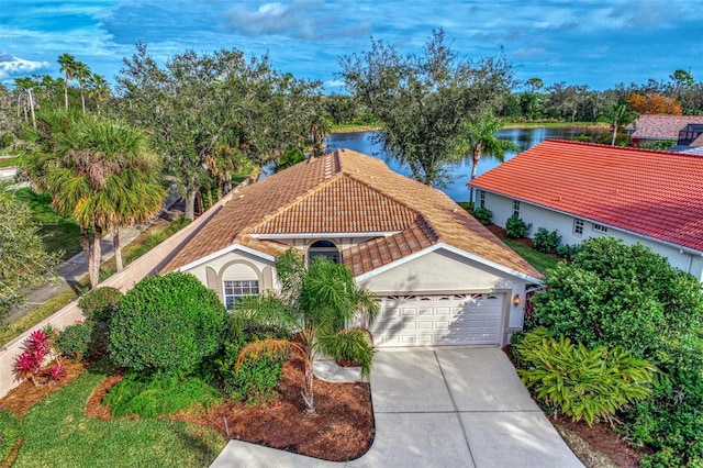 drone / aerial view featuring a water view