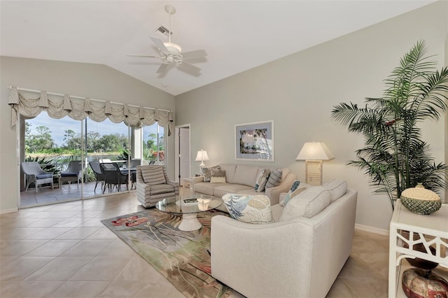 tiled living room featuring ceiling fan and vaulted ceiling