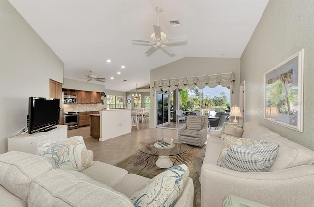 living room with vaulted ceiling and ceiling fan