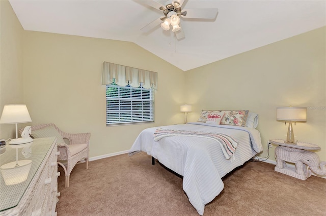 carpeted bedroom with baseboards, ceiling fan, and vaulted ceiling
