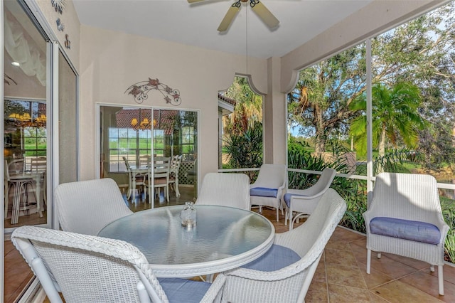 sunroom / solarium with ceiling fan