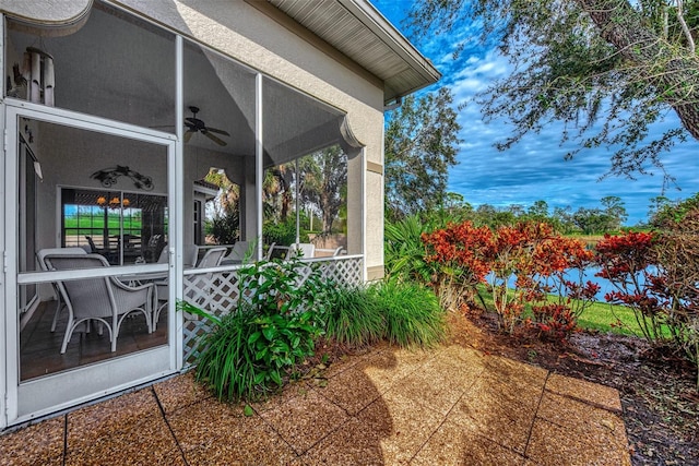 view of patio / terrace featuring ceiling fan