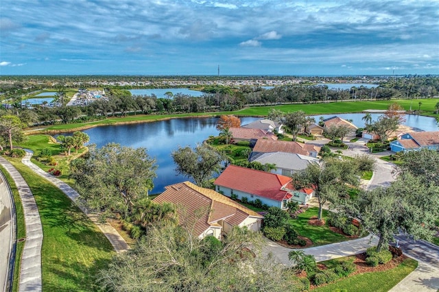 birds eye view of property featuring a water view