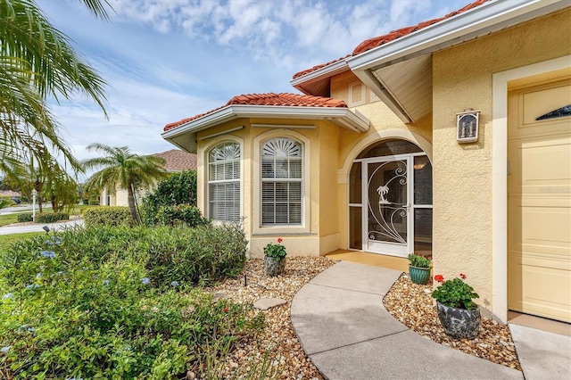 property entrance with a garage