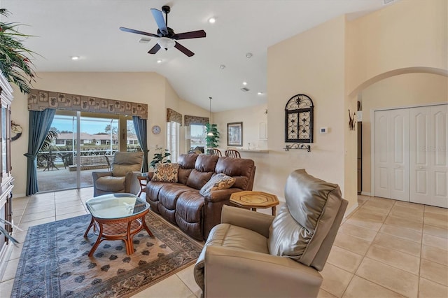 living room featuring ceiling fan, high vaulted ceiling, and light tile patterned floors