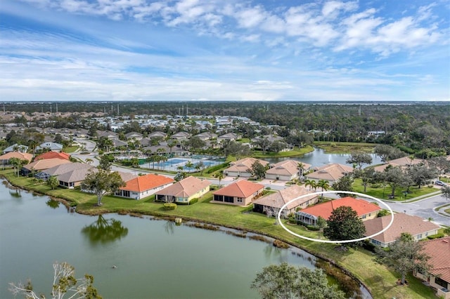 drone / aerial view with a water view