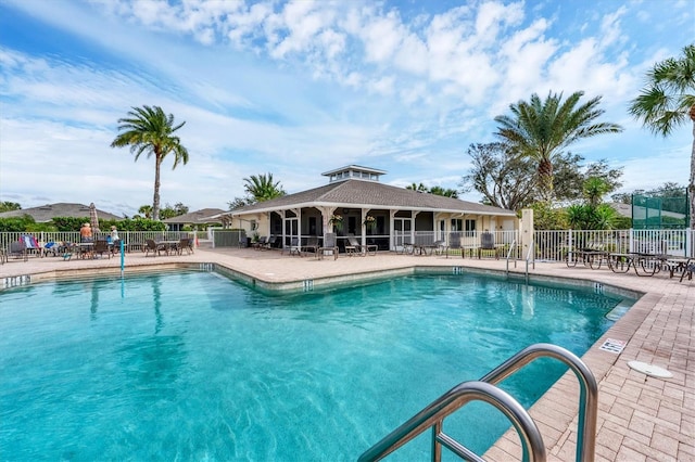 view of pool featuring a patio area