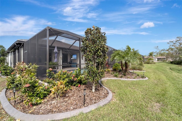 view of yard featuring a lanai