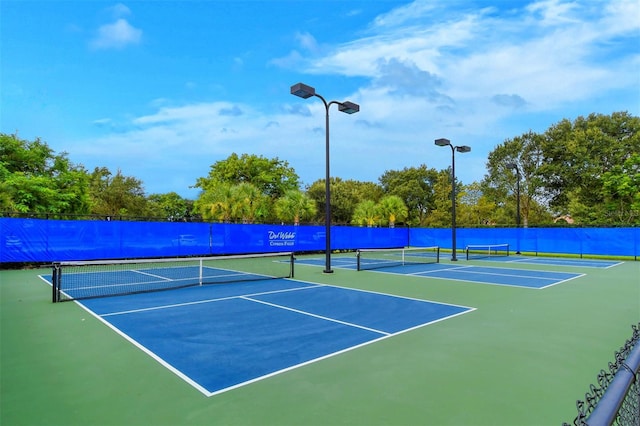 view of tennis court with basketball court