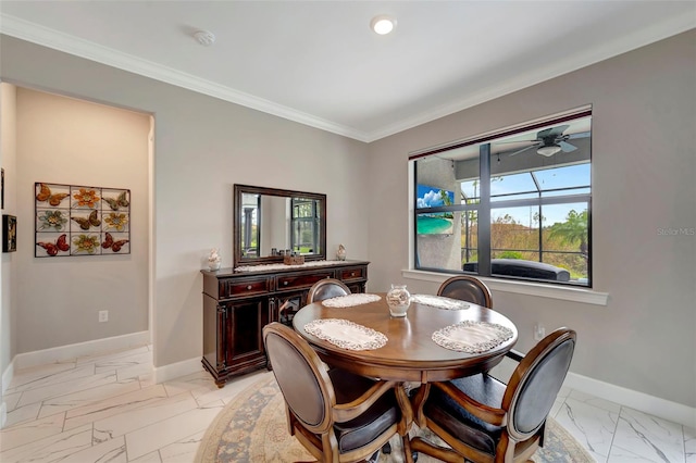 dining area featuring crown molding and ceiling fan