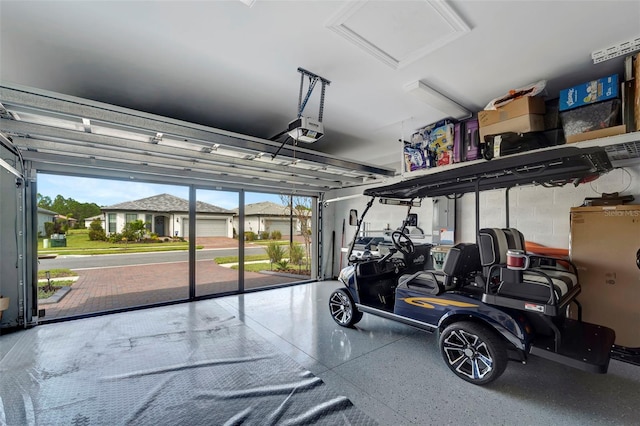 garage featuring a garage door opener