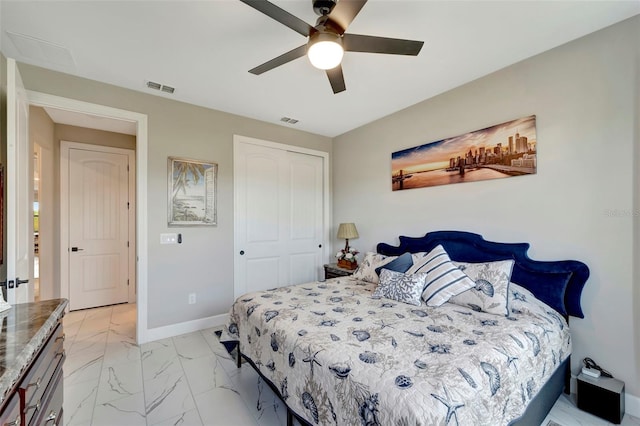 bedroom featuring a closet and ceiling fan