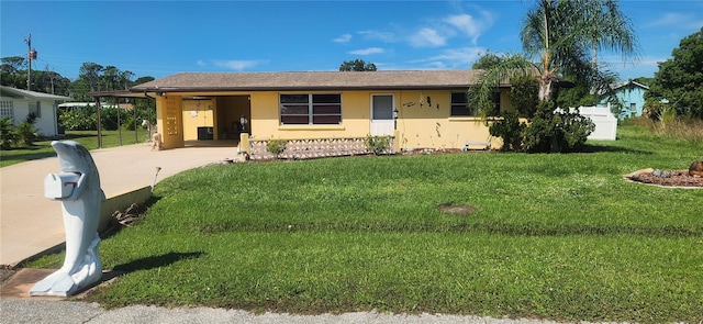 ranch-style house with a front yard