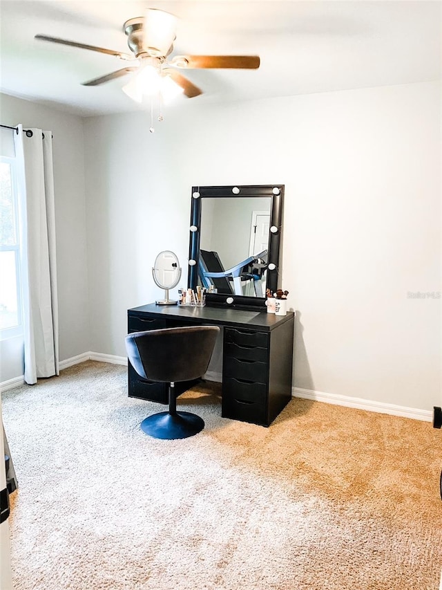 office area featuring ceiling fan and carpet