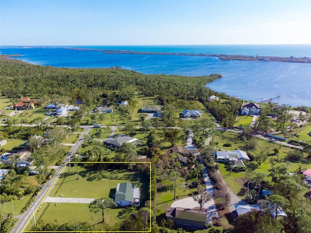 bird's eye view with a water view