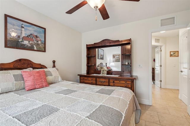 tiled bedroom featuring ceiling fan