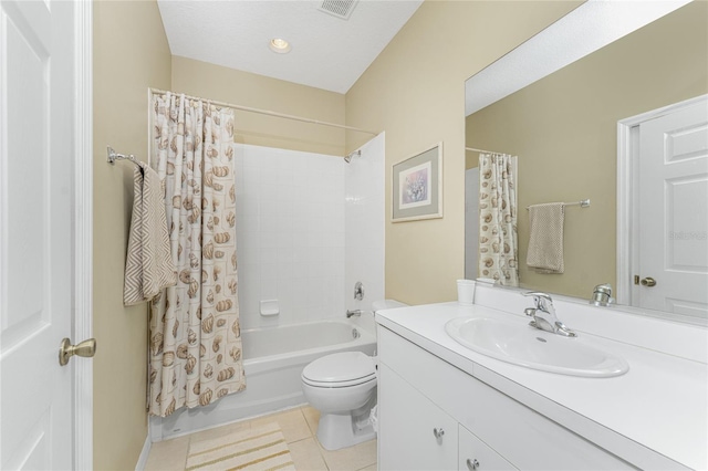 full bathroom featuring vanity, shower / bath combo, toilet, and tile patterned flooring