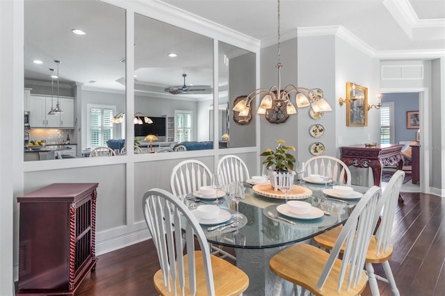 dining area featuring ornamental molding, dark hardwood / wood-style flooring, and ceiling fan