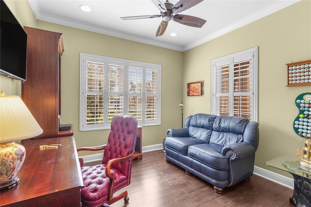 office area with crown molding, dark hardwood / wood-style floors, and ceiling fan