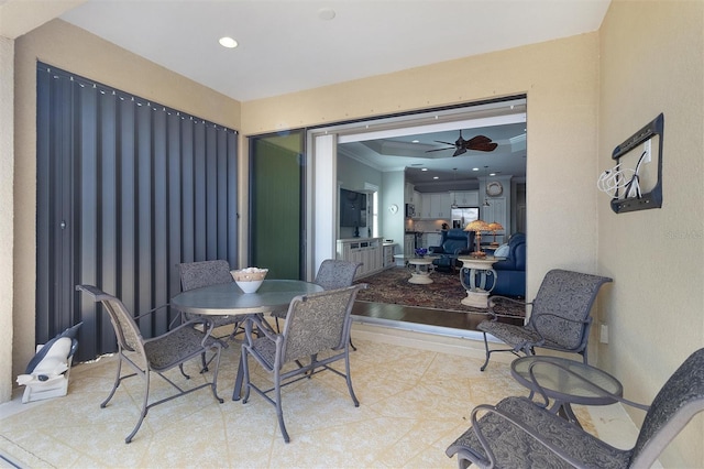 view of patio featuring ceiling fan