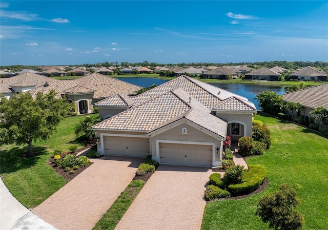 bird's eye view with a water view