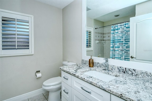 bathroom featuring tile patterned flooring, toilet, a shower with shower curtain, vanity, and a textured ceiling