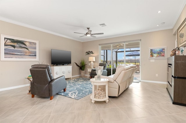 tiled living room with crown molding and ceiling fan