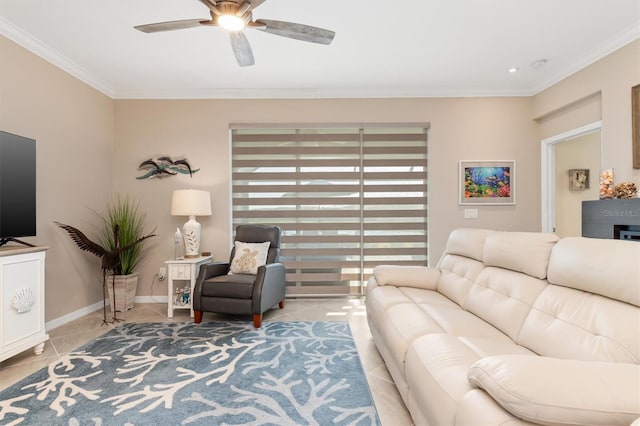 living room with ceiling fan, ornamental molding, and light tile patterned floors