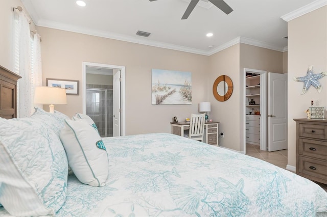 tiled bedroom with a spacious closet, ceiling fan, a closet, and crown molding