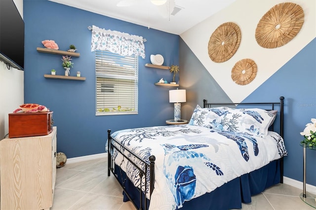 bedroom featuring ceiling fan and light tile patterned flooring