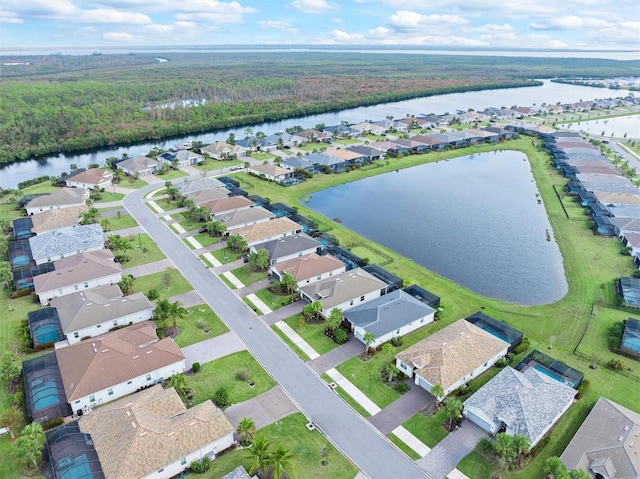 drone / aerial view with a water view