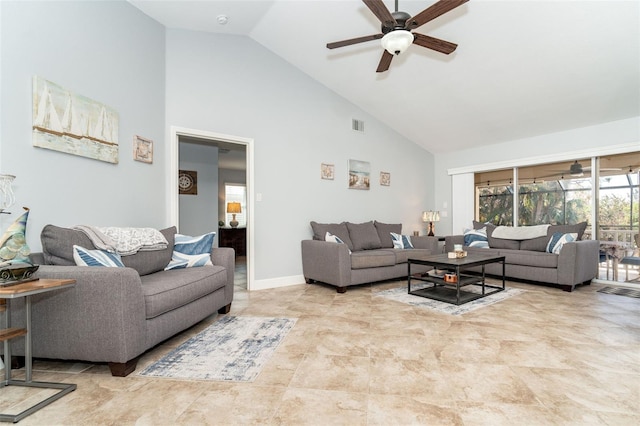 living room with ceiling fan and high vaulted ceiling