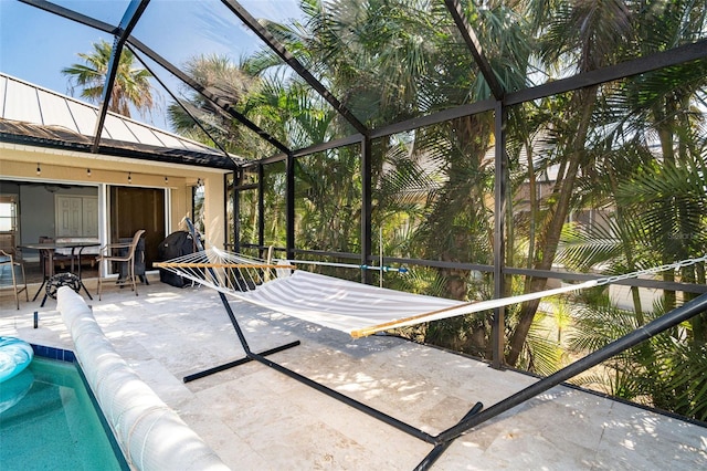 exterior space with a patio and a lanai