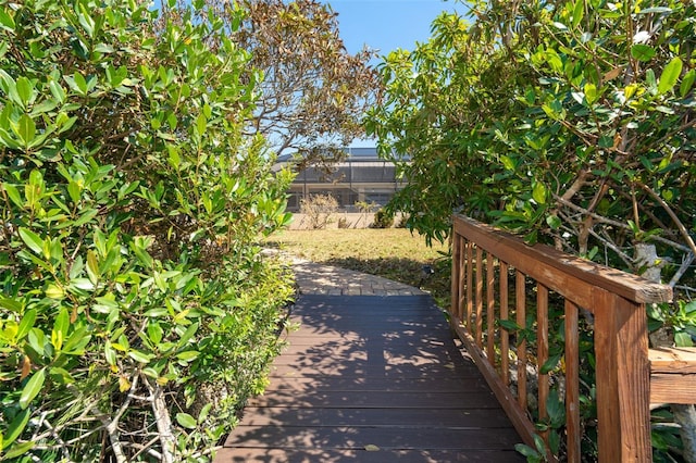 view of yard featuring glass enclosure