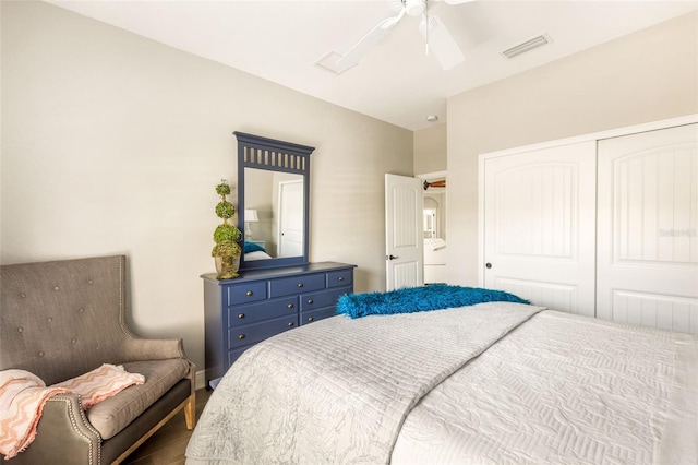 bedroom featuring a closet, hardwood / wood-style flooring, and ceiling fan